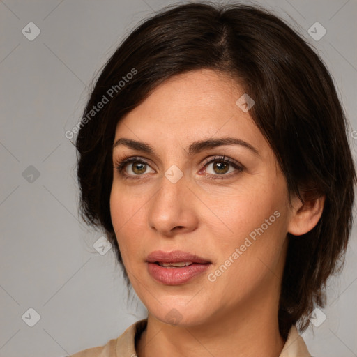 Joyful white adult female with medium  brown hair and brown eyes