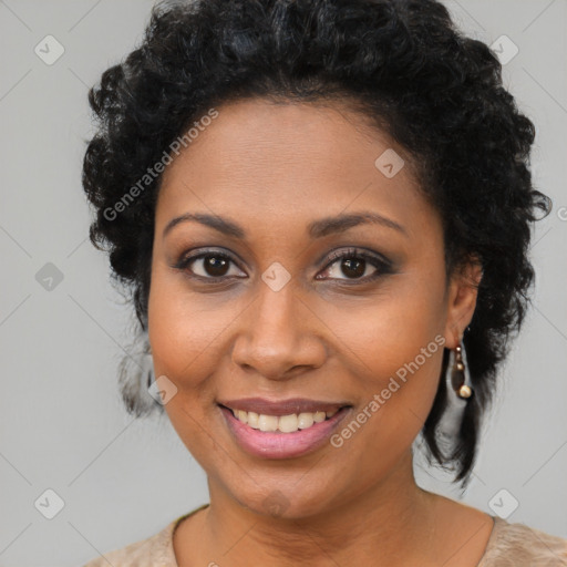 Joyful black young-adult female with medium  brown hair and brown eyes