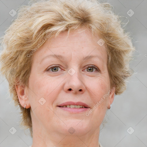 Joyful white adult female with medium  brown hair and blue eyes