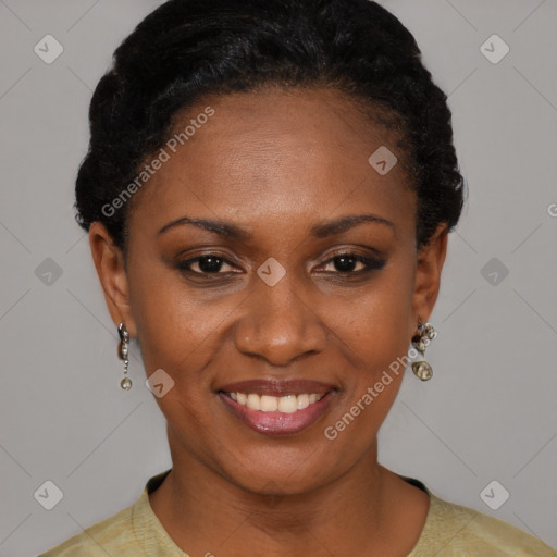 Joyful black adult female with short  black hair and brown eyes