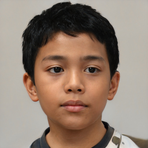 Neutral asian child male with short  black hair and brown eyes