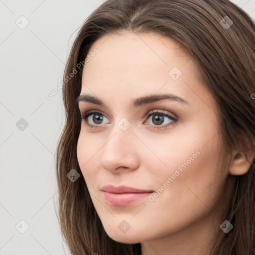 Neutral white young-adult female with long  brown hair and brown eyes