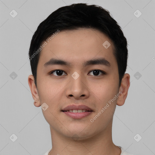 Joyful asian young-adult male with short  black hair and brown eyes