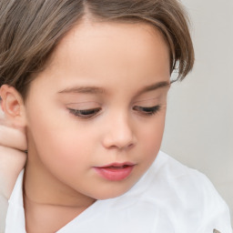 Neutral white child female with short  brown hair and brown eyes