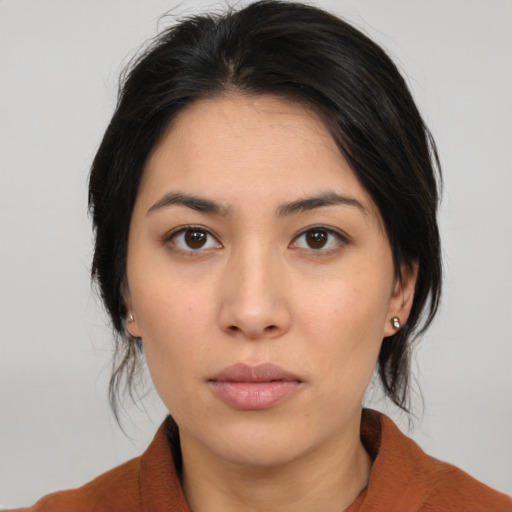 Neutral latino young-adult female with medium  brown hair and brown eyes