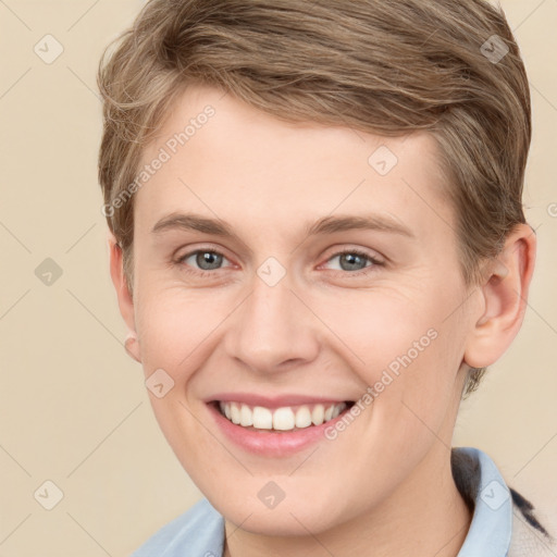 Joyful white young-adult female with short  brown hair and grey eyes