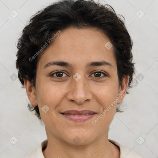 Joyful white adult female with short  brown hair and brown eyes