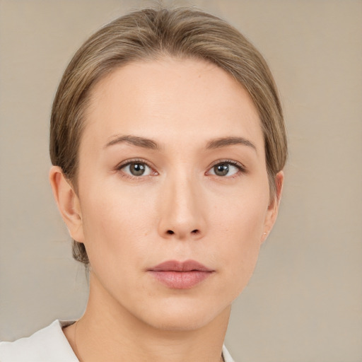 Neutral white young-adult female with short  brown hair and brown eyes