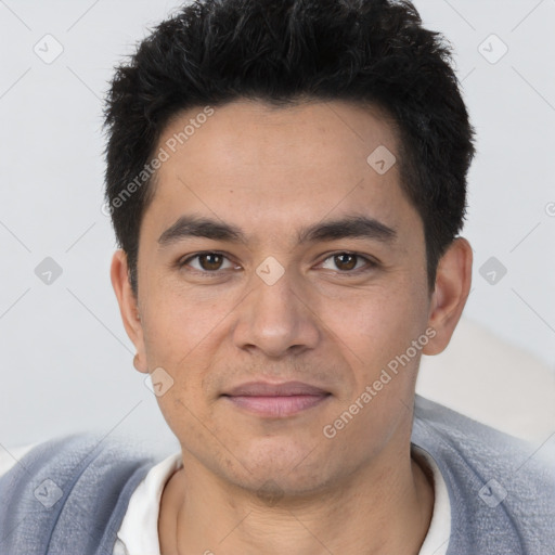 Joyful white young-adult male with short  black hair and brown eyes