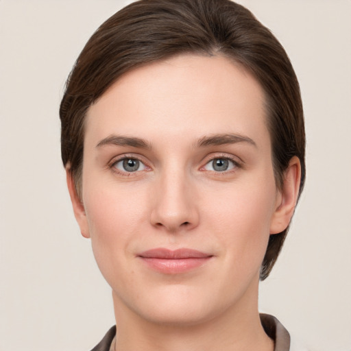 Neutral white young-adult female with short  brown hair and brown eyes