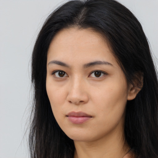 Neutral asian young-adult female with long  black hair and brown eyes