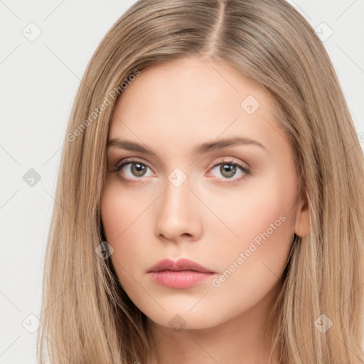 Neutral white young-adult female with long  brown hair and brown eyes