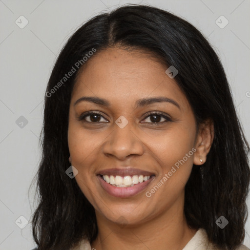 Joyful black young-adult female with medium  brown hair and brown eyes