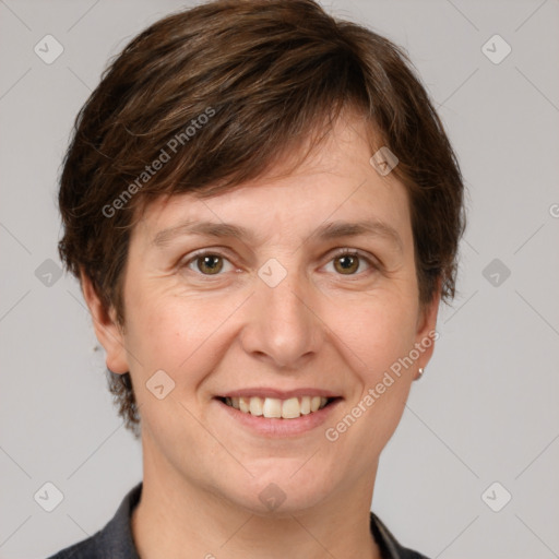 Joyful white adult female with medium  brown hair and grey eyes