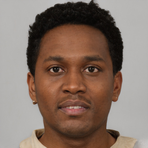 Neutral black young-adult male with short  brown hair and brown eyes