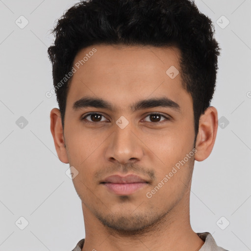 Neutral latino young-adult male with short  black hair and brown eyes