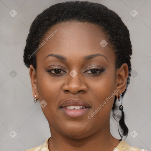 Joyful black young-adult female with short  brown hair and brown eyes