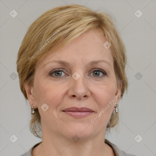 Joyful white adult female with medium  brown hair and grey eyes