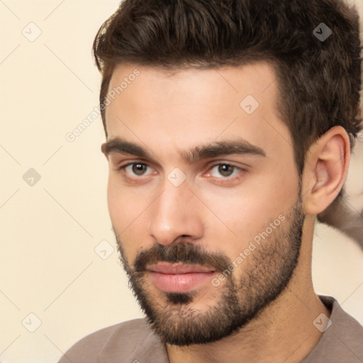 Neutral white young-adult male with short  brown hair and brown eyes