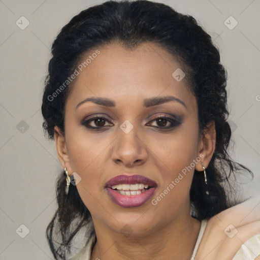 Joyful black young-adult female with long  brown hair and brown eyes