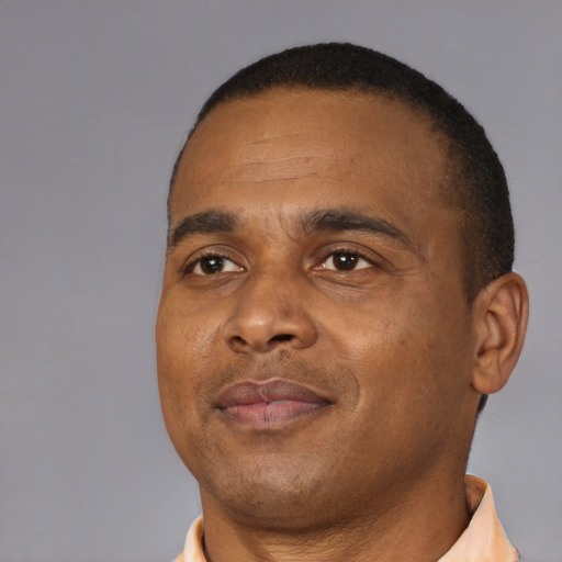 Neutral black young-adult male with short  brown hair and brown eyes