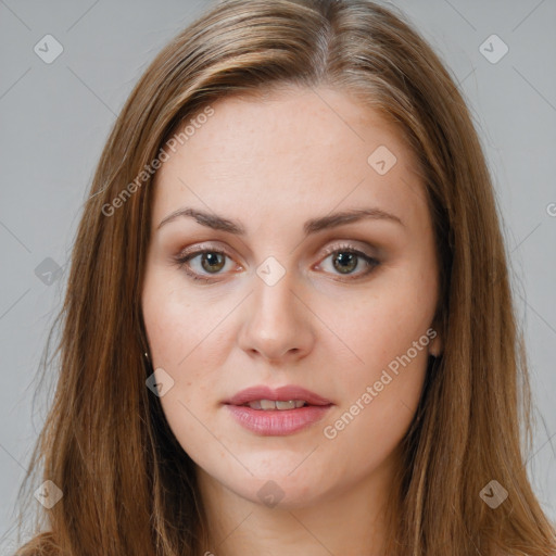 Neutral white young-adult female with long  brown hair and brown eyes