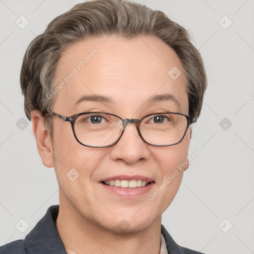 Joyful white adult female with short  brown hair and grey eyes