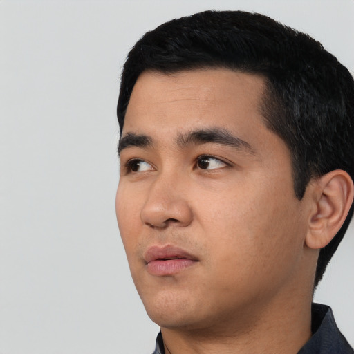 Neutral asian young-adult male with short  black hair and brown eyes