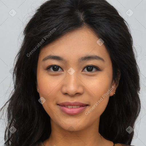 Joyful asian young-adult female with long  brown hair and brown eyes