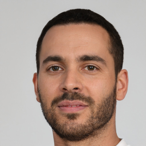 Neutral white young-adult male with short  black hair and brown eyes