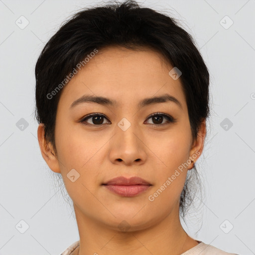 Joyful asian young-adult female with short  brown hair and brown eyes