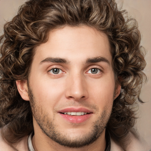 Joyful white young-adult male with medium  brown hair and brown eyes