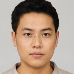 Neutral asian young-adult male with short  brown hair and brown eyes