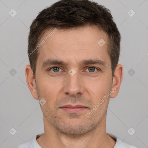 Neutral white young-adult male with short  brown hair and brown eyes