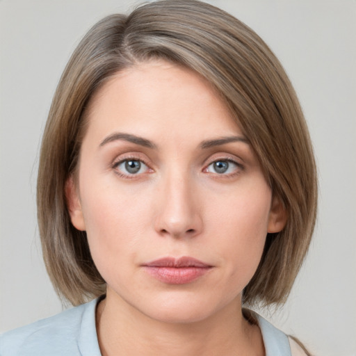 Neutral white young-adult female with medium  brown hair and blue eyes