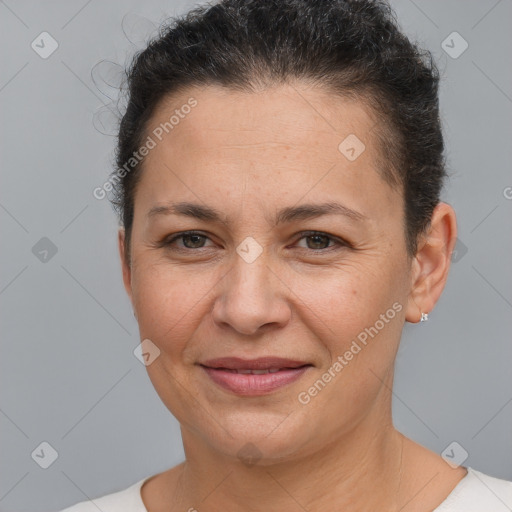 Joyful white adult female with short  brown hair and brown eyes