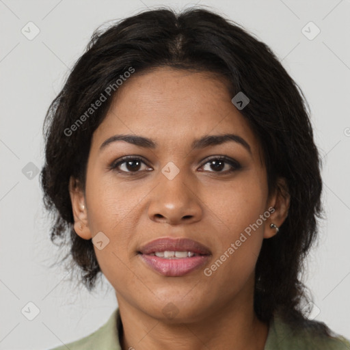 Joyful black young-adult female with medium  brown hair and brown eyes