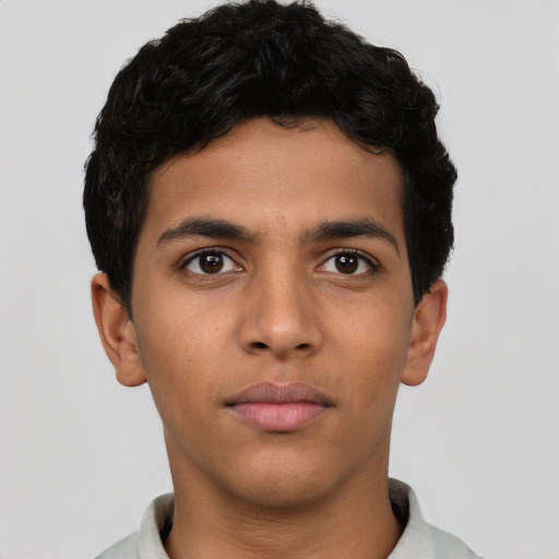Neutral latino young-adult male with short  brown hair and brown eyes
