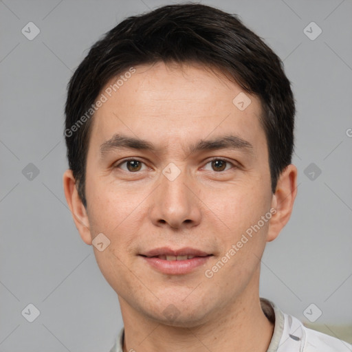 Joyful white young-adult male with short  brown hair and brown eyes