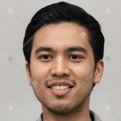 Joyful asian young-adult male with short  black hair and brown eyes