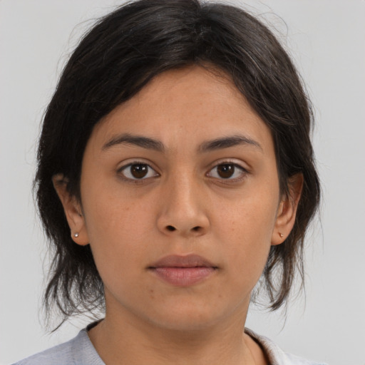 Neutral asian young-adult female with medium  brown hair and brown eyes