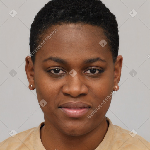 Joyful black young-adult female with short  black hair and brown eyes