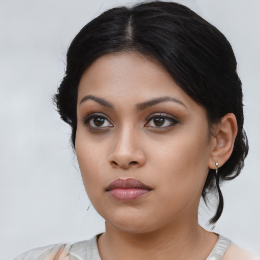 Neutral latino young-adult female with medium  black hair and brown eyes