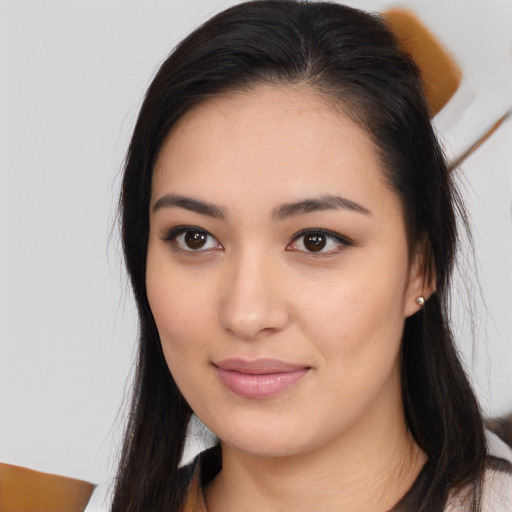 Joyful white young-adult female with medium  black hair and brown eyes