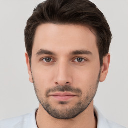 Neutral white young-adult male with short  brown hair and brown eyes