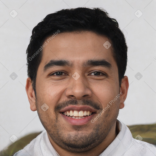 Joyful latino young-adult male with short  black hair and brown eyes