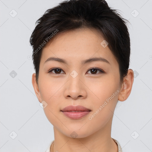 Joyful asian young-adult female with short  brown hair and brown eyes