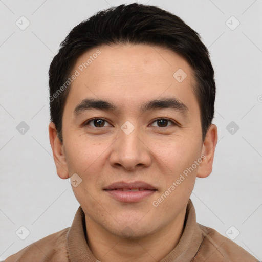 Joyful white young-adult male with short  black hair and brown eyes