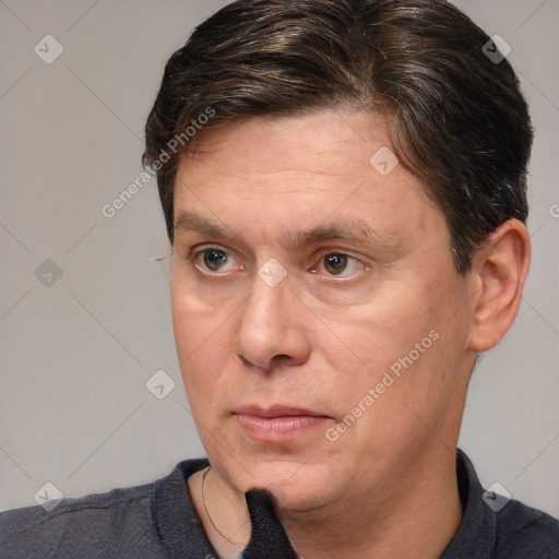 Neutral white adult male with short  brown hair and brown eyes