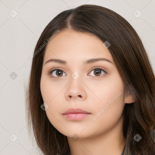 Neutral white young-adult female with long  brown hair and brown eyes